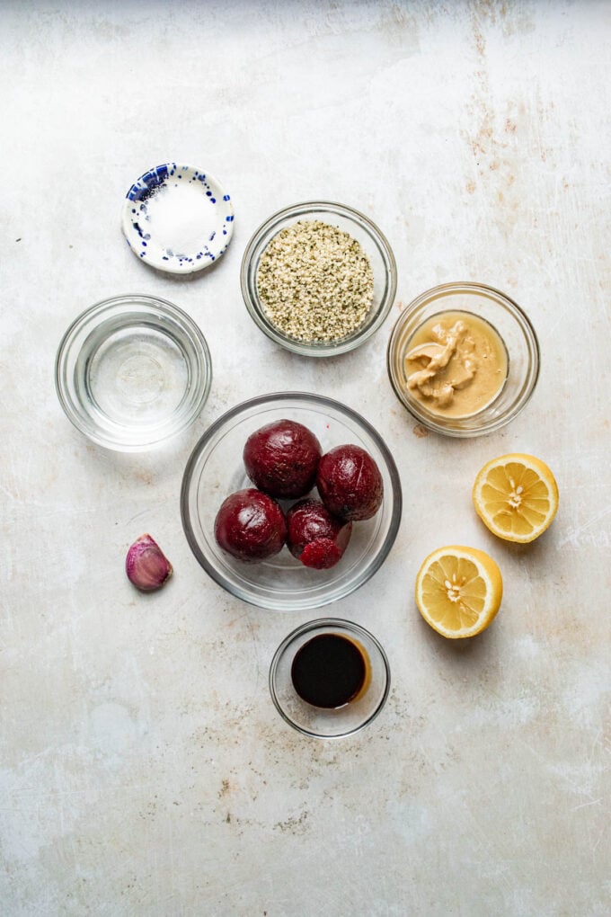 beets, hemp hearts, lemon, tahini in bowls