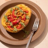 spaghetti squash with peppers and chickpeas on brown plate