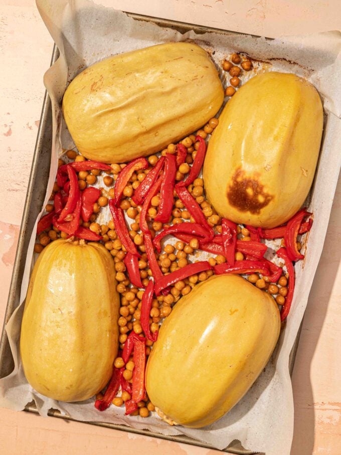 roasted spaghetti squash, peppers and chickpeas on pan