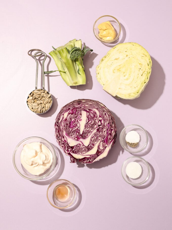 cabbage, mayo and broccoli on purple background