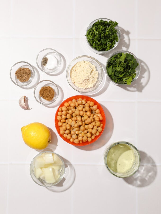 chickpeas, herbs and lemon in bowls