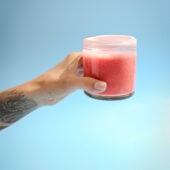 hand holding smoothie