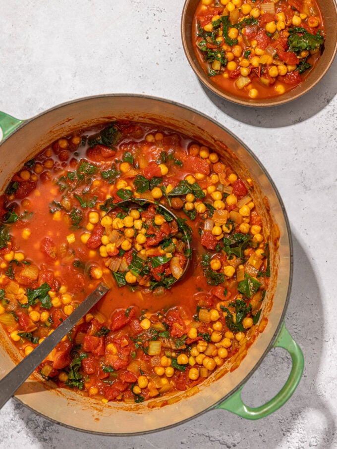 chickpea stew in pot with ladle