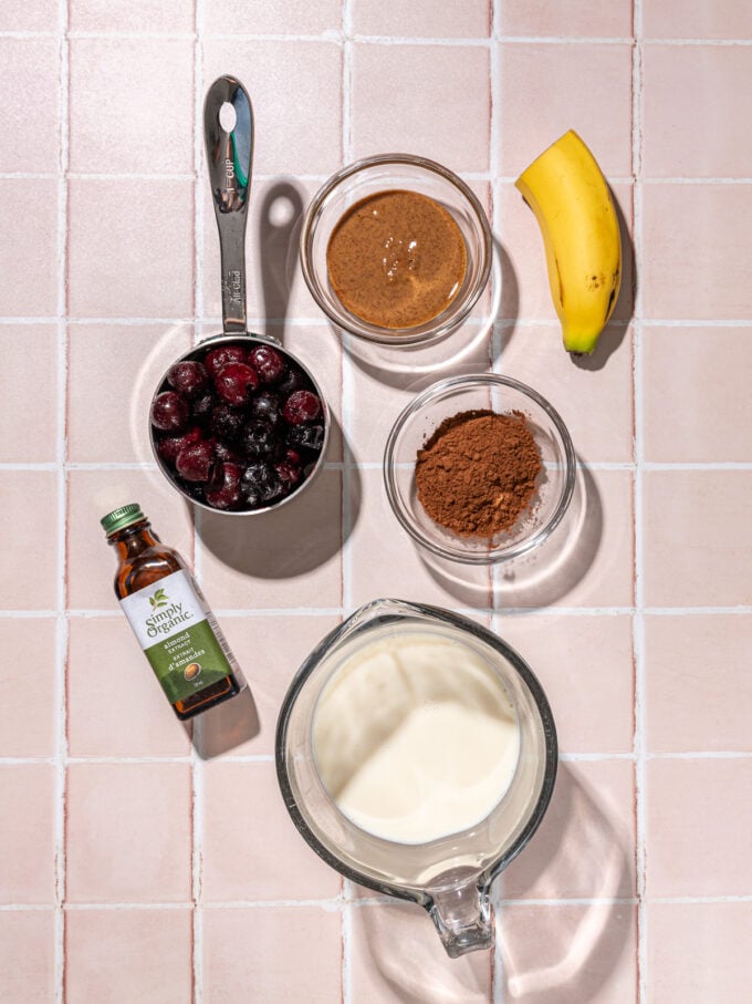 milk, cherries, almond butter in bowls