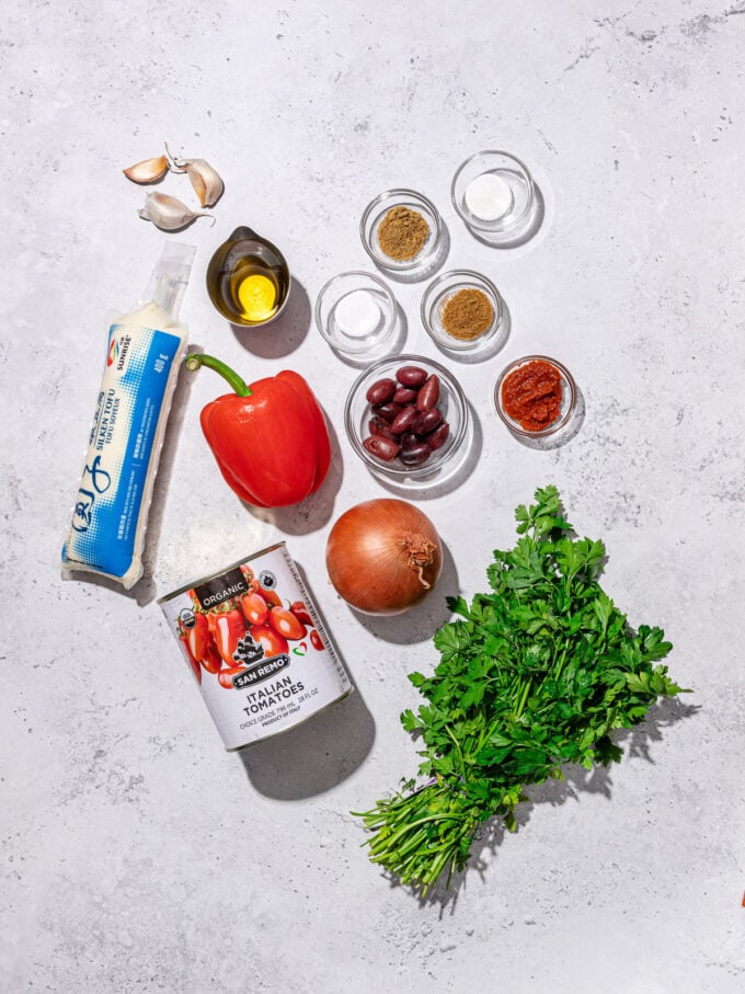 silken tofu, can of tomatoes, cilantro, onion, pepper and spices