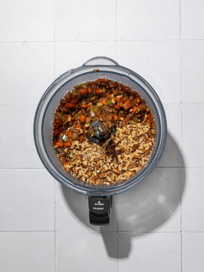 walnuts and cooked vegetables in food processor