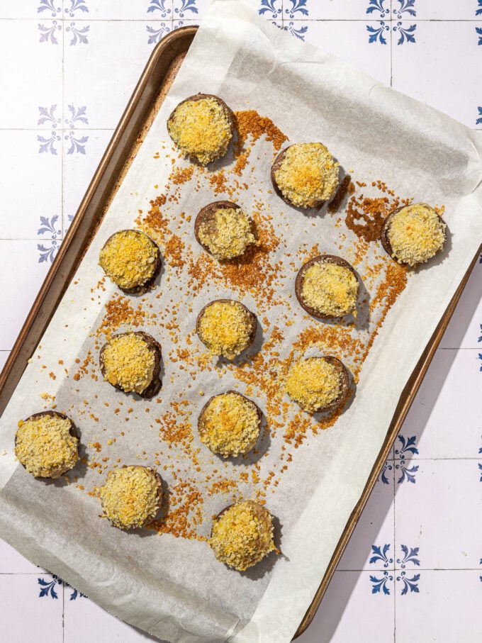 panko topped mushrooms on baking sheet